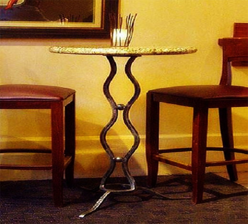 A Beautiful Table With Candle Holder in Table